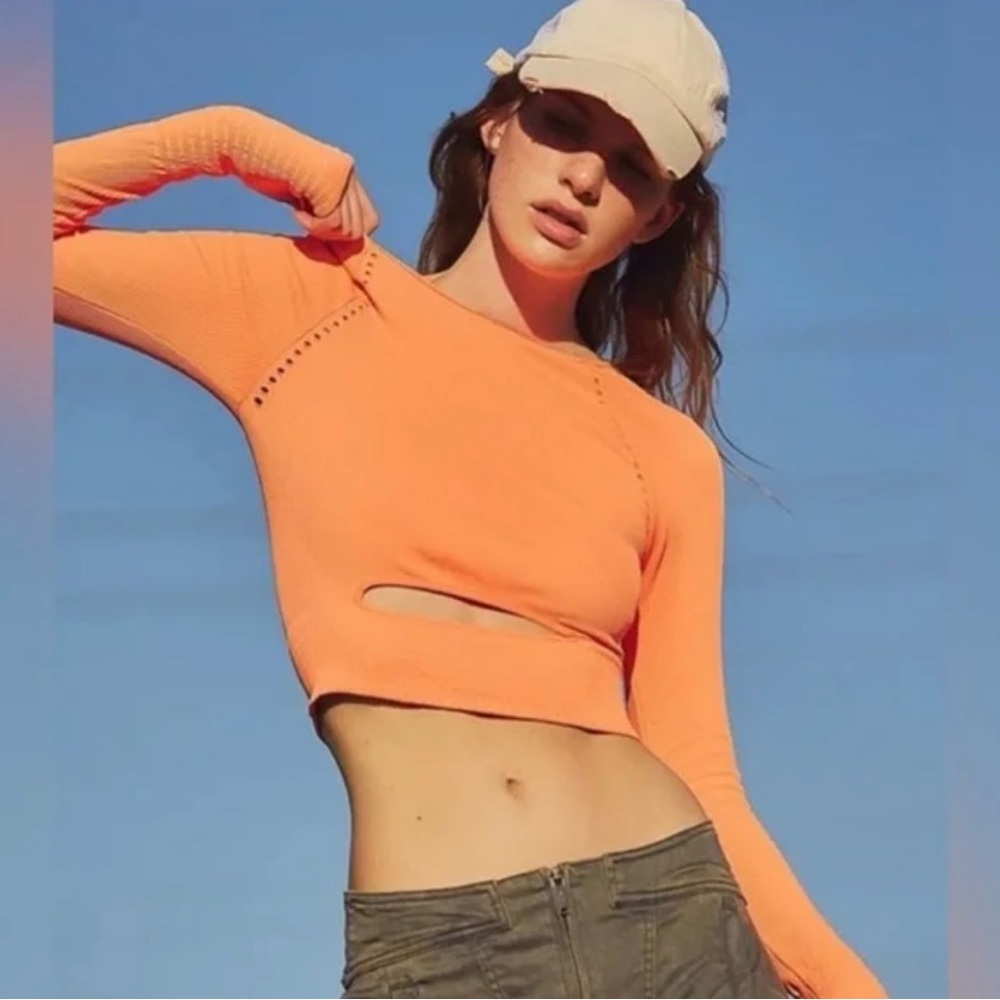 FP movement Women's Neon Orange Long Sleeve Crop Top
